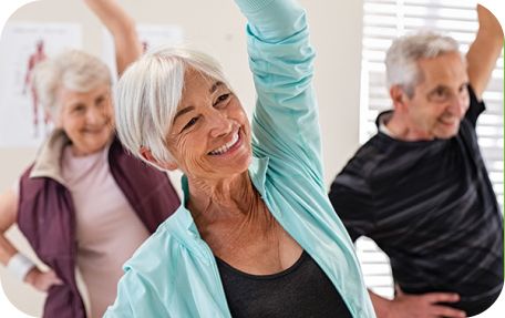 people stretching and smiling