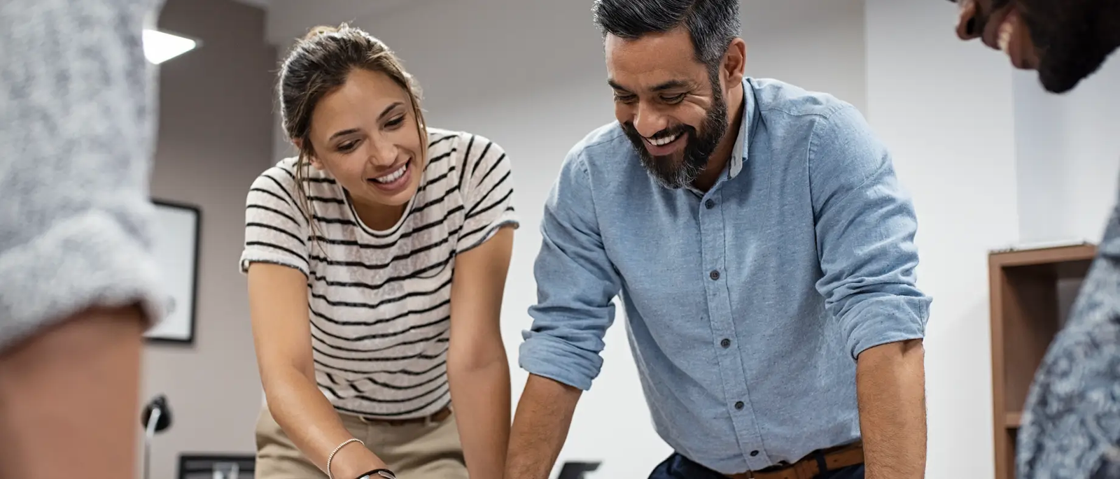 man and woman smiling